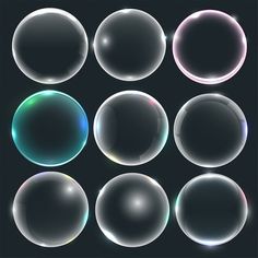 a set of soap bubbles on a black background