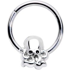 a metal ring with two skulls on it