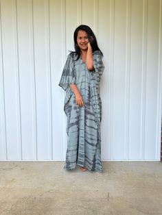 Unwind in absolute comfort with our semi sheer cotton gauze kaftan. This kaftan is perfect for the beach, pool, resort and laid-back time at home. Crafted from quality soft and breathable gauze cotton, it offers an airy fit that's ideal for lounging and cover up. Its relaxed design and easy slip-on style make it your go-to choice for outdoor cover up and relaxed nights at home. Casual Summer Kimono With Natural Dye, Flowy V-neck Kaftan For Poolside, Bohemian Style Beach Cover-up With Relaxed Fit, Bohemian Unlined Kaftan For Beach Cover-up, Bohemian Oversized Cover-up For Poolside, Summer Maxi Length Cover-up For Loungewear, Bohemian Kaftan For Beach Cover-up, Long Beach Kimono With Natural Dye, Casual Free Size Kaftan For Beach Cover-up