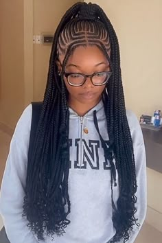 25 Stylish Middle Part Tribal Braids: Centering Tradition with Trend Middle Cornrows, 2 Braids Down The Middle, Middle Part Tribals, Half Up Half Down Fulani Braids, Middle Part Cornrows Braids, Middle Part Cornrows, Layered Feed In Braids