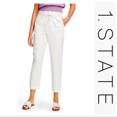 Refined Trouser Styling Is Updated For The Season In These Tapered Pants Featuring A Waist Tie, Tailored Front Pleats And Cropped Cuffs. Soft Ecru Color. Removable Belt. Two Front Pockets. Side Zipper. Smoke Free Home. True To Size. -Ties At Waist -91% Viscose, 9% Polyester -Machine Wash, Line Dry Approximate Measurements: Length: 39” Waist: 17” Rise: 12.5” Inseam: 27.5” C2-Sd-F Summer Workwear Paperbag Waist Pants, Summer Business Casual Paperbag Waist Pants, White Business Casual Pants For Summer, Split Pants, Straps Jumpsuit, Black Ankle Pants, Tie Waist Pants, Paperbag Pants, Ruffle Jumpsuit