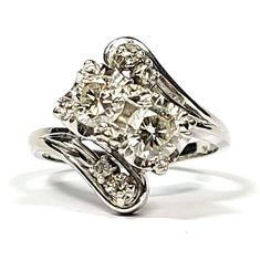 Vintage Double Diamond .78 Carat 14k White Gold Ring. It's in excellent condition with light wear.  The two large diamonds are .35 carats each. They are high quality round brilliant cut Vs2 - Si1 clarity I color. There are also 4 small round single cut diamonds totaling .08 carats. They are also high quality Vs2 - Si1 clarity The ring weighs 4.7 grams.  Don't pass up the chance to purchase this eye catching ring!  PvDzz2830. Antique Jewelry Rings, Double Diamond, 14k White Gold Ring, White Gold Ring, White Gold Rings, Vintage Watches, Round Brilliant, Gold Ring, Antique Jewelry