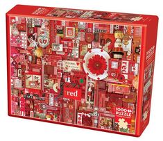 a red puzzle box filled with lots of different items