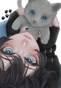 a woman laying down with a cat on her shoulder