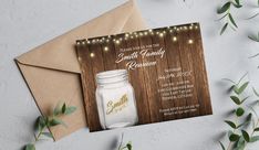 a card with a mason jar and string lights on it, next to an envelope