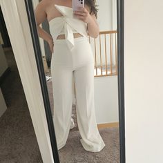 Bridal Jumpsuit. Strapless With Keyhole Opening And Bow Tie Front Detail. Never Worn, Just Tried On But It Was Too Small! No Tags But Well Made, Satin, Wide Legs, And Zip Back. Fits Like A Size 6 For A Small Chested Lady. Summer Wedding Strapless Jumpsuit, White High Waist Strapless Jumpsuit For Party, White Strapless Jumpsuit For Summer Wedding, Jumpsuit White, Bridal Jumpsuit, White Jumpsuit, Wide Legs, Bow Tie, Pant Jumpsuit