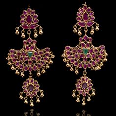 Get your traditional look right! The look includes entrancing tribal style earrings encrusted with shimmering stones. Approximate earrings length is 3.5". Designed over a high-quality brass as base metal. Made by order. Kindly allow 4-6 weeks for the delivery of this item. For custom or urgent requests, please contact support@alacouture.com. *Please Note: We use faux stones and beads in all of our jewelry. Metal Chandbali Chandelier Earrings With Intricate Design, Metal Chandelier Earrings With Intricate Design For Festivals, Festive Heavy Temple Jewelry Earrings, Festive Metal Temple Jewelry Earrings, Temple Jewelry Style Metal Chandelier Earrings, Traditional Festive Metal Earrings, Traditional Metal Earrings For Festive Occasions, Metal Temple Jewelry Chandelier Earrings, Traditional Metal Chandelier Earrings With Intricate Design