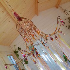 a chandelier hanging from the ceiling in a room