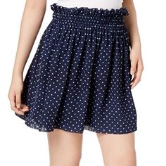 Description: Lovely Navy Blue Polka Dotted Mini Skirt From Maison Jules With Ruffled Elastic Waistband And Pockets. Skirt Is Super Flowy And Swishy - Perfect For Twirling In! Skirt Has Navy Blue Liner Underneath. The First Photo Is Not Mine. It Is A Stock Photograph Included For Some Perspective On What It Would Look Like On. Condition: Received As A Gift But It Didn't Fit Me Quite Right, Never Worn With No Flaws. New With Tags. See Pictures For Measurements Casual Polka Dot Mini Bottoms, Spring Polka Dot Mini Skirt, Spring Mini Skirt In Polka Dot, Polka Dot Mini Length Bottoms For Spring, Casual Polka Dot Ruffled Skirt, Polka Dot Mini Bottoms For Spring, Casual Ruffled Polka Dot Skirt, Casual Polka Dot Tiered Skirt, Spring Polka Dot Mini Bottoms