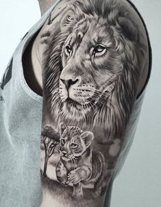 a man with a lion and tiger tattoo on his arm