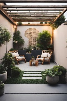 an outdoor living area with chairs and potted plants