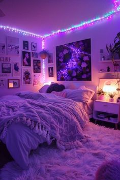 a bedroom with purple lights on the ceiling and white fur rugs in front of the bed