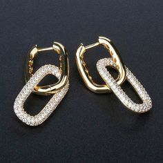 Features a modern open link drop earrings set with sparkling pavé accents on the bottom link and hinge back closure. *100% 925 Sterling Silver *Weight: 10.5g *18K White, Yellow & Rose Gold Plated available *Nickel and Lead Free *Includes free gift box ⚜️This specific jewelry is made to order. The production time is about 10 days, and the transportation takes 5-8 days. ⚜️Strictly NO RETURNS as we produce according to the customer's order and we conduct stringent inspections on all finished products. Thank you for visiting my shop and I hope you found what you were looking for. Please feel free to message me for any questions prior to purchasing. You can also follow us on instagram☺️@xplicitluxe Enjoy FREE SHIPPING on EVERY PURCHASE 24/7/365!📦 Simple Wedding Earrings, Gorgeous Wedding Bands, Korean Jewelry, Triangle Pendant, Link Earrings, Earring For Women, Cz Jewelry, Cubic Zirconia Earrings, Colorful Earrings