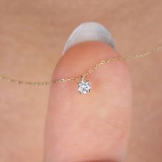 "Show that you value your loved one. Our tiny diamond necklace; It is suitable for daily use, a nice gift for your lover. Shine with this stylish and elegant solitaire necklace. April birthstone necklace 🤍🤍 Special gifts for your special moments. We produce our jewelery for you in the most perfect way. 🤍🤍 All of our products are carefully crafted from 14k Solid gold and Real diamonds. FEATURES * Made to order. * Gold Color Selection: Yellow Gold, Rose Gold, White Gold * Gold KT: 14K * Length Dainty Solitaire Necklace For Anniversary, Dainty White Gold Birthstone Necklace For Anniversary, Minimalist Diamond Solitaire Necklace With Birthstone, Diamond White Birthstone Necklace With Single Diamond For Anniversary, Diamond White Birthstone Necklace For Anniversary, 14k Gold Solitaire Necklace With Single Diamond As Gift, 14k Gold Solitaire Necklace With Prong Setting As Gift, 14k Gold Round Cut Diamond Necklace Gift, Diamond White Solitaire Necklace With Birthstone For Anniversary