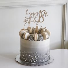 a birthday cake with frosting and decorations on top