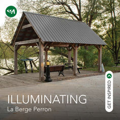 a gazebo sitting on top of a wooden platform