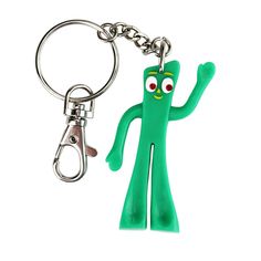 a green keychain with a cartoon character on it's face and eyes