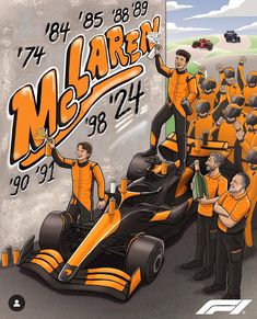 a group of men in orange racing suits standing next to a race car