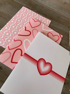 valentine's day cards with hearts on them and envelopes in pink, red and white