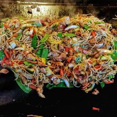 a large pile of food sitting on top of a counter