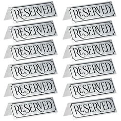 several stickers that say reserved, reserved, reserved and reserved on each one side