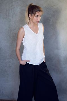 V-neck tank top made from pure, soft washed linen. «Must-have» basic linen shirt, that can be combined with any item from your closet. COMPOSITION - 100% linen, soft washed - Medium weight linen - Oeko-tex certified fabric, that does not contain any harmful substances and meets human-ecological requirements. SIZE - XS (US 2, UK 6, Europe 34, AU/NZ 6) Recommended size of BODY Bust: 31,5 in | 80 cm Waist: 24,4 in | 62 cm Hips: 33,8 in | 86 cm Size of GARMENT Bust: ± 33,8 in | 86 cm Length: ± 24,8 Cut Tank Top, White Linen Top, Linen Tank Top, V Neck Shirt, Natural Linen Fabric, Linen Tank, V Neck Tank Top, How To Make Clothes, Linen Blouse