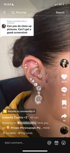 a woman with piercings on her ear