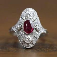 1.5 CT Oval Art Deco Ring  Vintage Ring  Ruby & Diamonds Ring | Halo diamond Anniversary Ring | 925 Sterling Silver - 935 Argentium Silver & 10K-14K-18K Solid Gold Ring. The stone was originally cut and polished by our skilled craftsmen, the stones in jewelry are 100% handcrafted. Moissanite is a great alternative to mind diamonds. ● A matching piece is also listed below in the "Matching Piece" section. ✥ 𝐌𝐚𝐢𝐧 𝐒𝐭𝐨𝐧𝐞 𝐃𝐞𝐭𝐚𝐢𝐥𝐬: ↣ Shape: Oval ↣ Type: Moissanite ↣ Weight: 1.50 CT (App Vvs Jewelry, Silver Gold Ring, Antique Rings Vintage, Jewelry Details, Ruby Diamond Rings, Antique Ring, Gold And Silver Rings, Diamonds Ring, Diamond Anniversary Rings