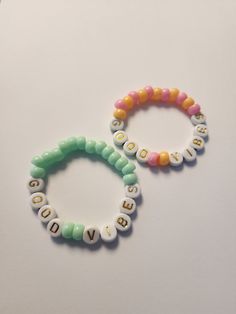 These Kandi bracelets are the perfect addition to your accessory collection! Each bracelet is customizable, allowing you to pick your own colors and words.  Key Features: - Customizable design - Vibrant colors - Perfect for festivals and events Choose from a variety of colors to create a unique and eye-catching accessory. These bracelets are perfect for festivals, concerts, or any event where you want to stand out from the crowd.  Express yourself with words or phrases that have special meaning Kandi Inspo Cuff, Funny Bracelets, Plur Bracelets Kandi, Trans Kandi Cuff, X Cuff Kandi, Rave Cuffs Kandi, Bracelets Kandi, Bracelets Beads, Kandi Bracelets