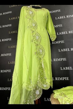 -Green color salwar suit for women -fabric used Pure habutai silk of suit and pure organza for dupatta - colour Green - Handwork details on dupatta and Salwar and shirt - size (customisation available) -Dry clean only Fitted Organza Kurta With Mirror Work, Anarkali Raw Silk Lawn Suit For Party, Party Lawn Suit With Dupatta In Raw Silk, Green Silk Unstitched Suit With Dabka Work, Designer Chanderi Lawn Suit With Mirror Work, Chanderi Lawn Suit With Mirror Work, Party Chanderi Straight Kurta Lawn Suit, Party Wear Straight Kurta Chanderi Lawn Suit, Fitted Raw Silk Lawn Suit With Mirror Work