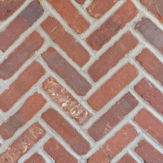 a close up of a brick wall with the word love written on it