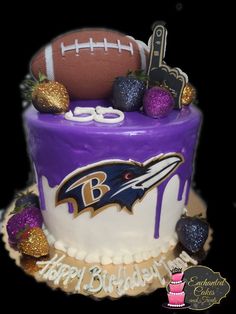 a football themed birthday cake with purple frosting