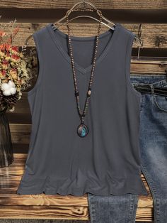 Gray Solid Casual V-neck Sleeveless Tank Gray V-neck Vest For Spring, Spring Gray V-neck Vest, Casual Summer Tank V-neck Top, Casual Summer V-neck Tank Top, Gray Sleeveless Tank Top For Layering, Gray V-neck Tank Top For Summer, Summer V-neck Layering Vest, Casual V-neck Tank Top For Layering, V-neck Tank Top For Layering