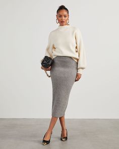 A seasonal fave, the Marciana Knit Midi Skirt is composed of thick, stretchy ribbed knit with an elastic waistband. It accentuates a body-hugging silhouette and hits just below the knee – perfect for showing off boots and heels. Elastic waistband Midi length Thick, stretchy ribbed knit No closures or lining 39% Polyester 18% Acrylic 12% Polyester 11% Wool 10% Rayon 5% Polyester 5% Nylon Gray Knitted Skirt Outfit, Green Knit Skirt Outfit, Casual Maxi Skirt Outfits, Knit Midi Skirt Outfit Fall, Business Casual Skirt Outfit, Knit Long Skirt Outfit, Grey Sweater Skirt Outfit, Rib Skirt Outfit, Grey Wool Skirt Outfit