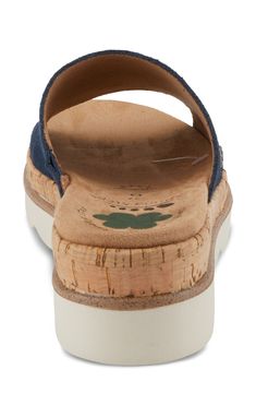 A sporty, scalloped sole is outfitted with RELIFE shock absorbency tech and stacked with a cushy cork footbed in this easy-on slide with crave-worthy comfort. 2" heel; 1 1/4" platform Synthetic upper/textile lining/synthetic sole Imported Hallmark Ventura Sandal, Casual Cork Slides With Round Toe, Comfortable Cork Footbed Sandals With Arch Support, Casual Cork Slides With Arch Support, Cork Beach Slides With Cushioned Footbed, Comfortable Cork Slides With Textured Footbed, Slip-on Cork Sandals With Arch Support, Casual Cork Footbed Sandals With Arch Support, Cork Slip-on Sandals With Arch Support