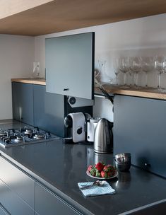 the kitchen counter is clean and ready for us to use in the day or night