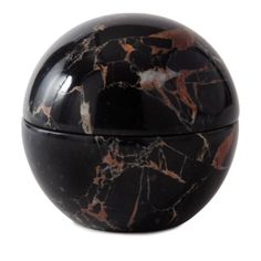 a black and brown marble covered container