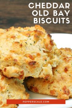 cheddar old bay biscuits on a white plate