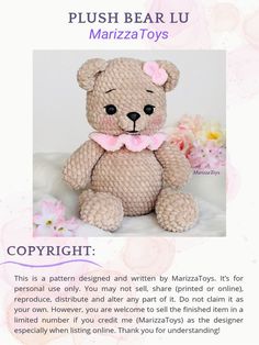 a teddy bear with a pink bow on it's neck sitting next to flowers