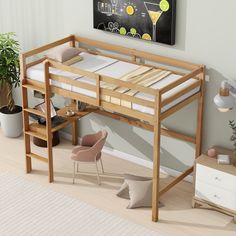 there is a loft bed with a desk underneath it and a chair next to it