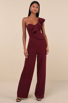 Spend an evening falling in love with the Lulus Kiss Me Again Burgundy Ruffled One-Shoulder Jumpsuit! Medium-weight, stretchy crepe knit sweeps from a double-tiered, flouncy one-shoulder strap and into a princess-seamed bodice (with hidden no-slip strips). High, fitted waist tops wide pant legs that fall to ankle-length hems. Hidden back zipper/clasp. Fit: This garment fits true to size. Length: Floor length. Size medium measures 60" from shoulder to hem. Inseam: 32.75 Front Rise: 15.00 Bust: Gr Country Wedding Guest Dress, Jumpsuit For Wedding Guest, Burgundy Jumpsuit, Casual Formal Dresses, Formal Jumpsuit, One Shoulder Jumpsuit, Casual Wedding Dress, Wide Pants, Strapless Bra