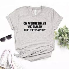 On Wednesdays Smash The Patriarchy Soft Graphic Tee Shirt High-Quality Bella Canvas Tee 100% Soft Cotton Handmade And Shipped Within 1 Day! Custom Tee Tank Hoodie Workout Tank V-Neck Raglan Funny Sarcastic Cute Birthday Mom Daughter Gift Graphic Beach Tropical Pineapple Summer Vacation Holiday Pretty Dope Workout Date Night Girlfriend Sister I Was Left Unsupervised, Women Tshirts, Soft Graphic, Real Estate Advice, Smash The Patriarchy, Y2k Aesthetic Outfits, Funny Prints, Graphic Tee Shirt, Women Humor