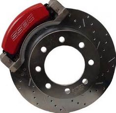 red brake disc on a white background