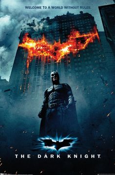 the dark knight movie poster with batman standing in front of skyscrapers and city lights