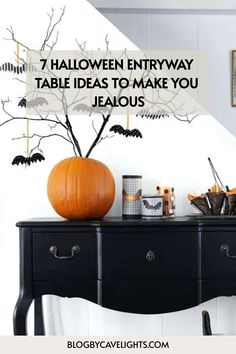 a halloween entryway table with an orange pumpkin on it and the words 7 halloween entryway table ideas to make you fabulous