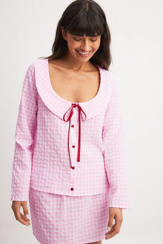 Checked Tie Front Top Pink Button-up Blouse For Loungewear, Pink Long Sleeve Blouse For Loungewear, Pink Long Sleeve Top For Daywear, Pink Long Sleeve Feminine Top, Feminine Pink Long Sleeve Top, Pink Long Sleeve Blouse For Daywear, Pink Long Sleeve Cotton Blouse, Long Sleeve Pink Blouse For Fall, Pink Long Sleeve Blouse For Fall