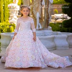 Sweet And Innocent, Precious Takes Natural Beauty To The Next Level With Its Gorgeous Sequined Beaded Fabric Over Soft Pink Lining. The Pastel Colorful 3d Flowers Add The Perfect Touch Of Whimsy To The Already Princess-Perfect Gown. The Bodice Is Fully Hand Beaded With Pearls, Beads And Sequins. Princess Pageant Gown With Floral Applique, Princess Style Dresses With Floral Applique For Pageants, Pink Princess Ball Gown For First Communion, White Ball Gown For Pageant, Princess Style Ball Gown With Floral Applique, White Ball Gown For Pageants, White Ball Gown Dress For Pageant, Pink Ball Gown For First Communion, Pink First Communion Ball Gown