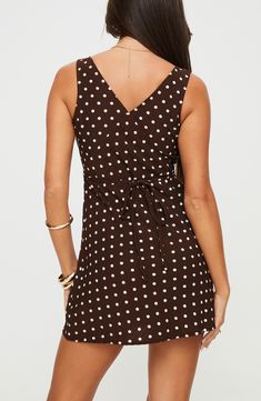 A tie-back detail ensures a perfect fit when you slip into this polka-dot minidress. 32" length (size 8) Hidden side-zip closure V-neck Sleeveless 100% polyester Machine wash, line dry Imported Nellie Mini Dress, V Neck Mini Dress, Brown Polka Dots, Fleece Dress, Outerwear Outfit, Loungewear Sets, Invisible Zip, Curve Dresses, Casual Tank Tops