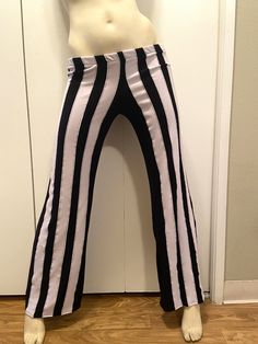 Ready to Ship! Pants Only Size M/L Hips - 35' - 38' Inseam - 31' Length - 39' Hand cut and stitched by sewing machine Made of Black Rayon & Pale Purple Elastic Waistband Black with Pale Purple Stripes - 12 Stripes Very stretchy, soft and comfy HAND WASH COLD AND LINE DRY WILL PRO LONG THE LIFE OF THE PIECE If you have any questions, please feel free to ask at any time Copyright Patched Jester Creations 2021 Rave Style Halloween Cosplay Bottoms, Rave Halloween Cosplay Bottoms, Black Rave Bottoms For Halloween, Rave Style Black Bottoms For Halloween, Stretch Gothic Bottoms For Cosplay, Gothic Stretch Bottoms For Cosplay, Punk Style Bottoms For Halloween Cosplay, Punk Style Halloween Cosplay Bottoms, Punk Halloween Cosplay Bottoms