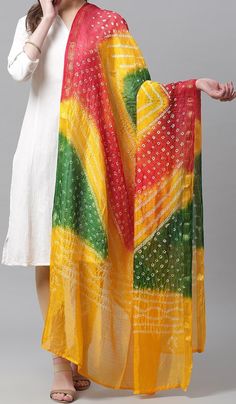 Silk Dimensions Width: 44 Inches; Length: 2.25 Metres Description Handmade Item WELCOME TO TieDyeDupatta Color :- Multi Colour Size:- Length : 2.5 Meters Width : 44 Inches Material: Thread, Silk  ETHNICITY CHUNRI SCARVES DUPATTA  1 PCS SOLID COLOR Dupatta, Rajasthani Bandhej Dupatta tapara Silk Bandhani Bandhej Women Heavy Dupatta Beautiful silk Indian dupatta with a hand dyed traditional chunri design. This solid tie-and-dye scarf has a very soft and light weight fabric. Lightweight scarf women Colourful Dupatta, Chunri Design, Wedding Dupatta, Bandhej Dupatta, Indian Dupatta, Heavy Dupatta, Big Rangoli Designs, Lightweight Scarf, Tie And Dye